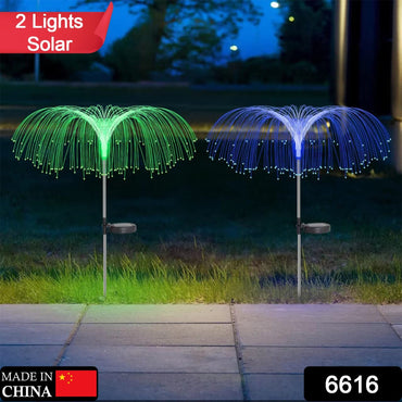 Colorful 7-color solar outdoor lights illuminating garden pathway at night