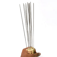 Packaging shot showing the 12-pack of durable BBQ skewers with pointed tips.