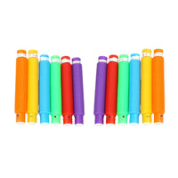 Child's hands stretching a yellow pop tube, demonstrating its flexibility.