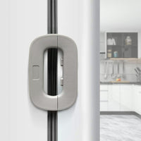 White fridge freezer door lock latch installed on refrigerator door for baby safety