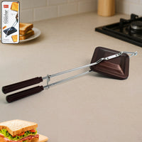 Gas Stove Sandwich Toaster making crispy grilled sandwich with non-stick surface.