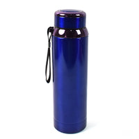 Stainless steel water bottle on table with drink inside