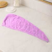 VelvaBloom Microfiber Hair Drying Towel neatly folded, ready for use or travel.
