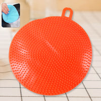 Red silicone dish scrubber for gentle non-stick cleaning