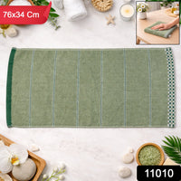 Soft cotton bath towel neatly folded for daily use and travel