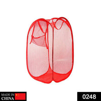 Foldable mesh laundry hamper with a side pocket, ideal for small items.