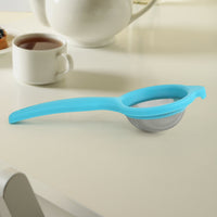 Kadak stainless steel mesh tea strainer with plastic handle on white background
