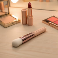 Makeup brush used for foundation and blush application with soft synthetic bristles