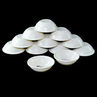 Elegant 32-piece plastic dinner set with plates, bowls, and cutlery.