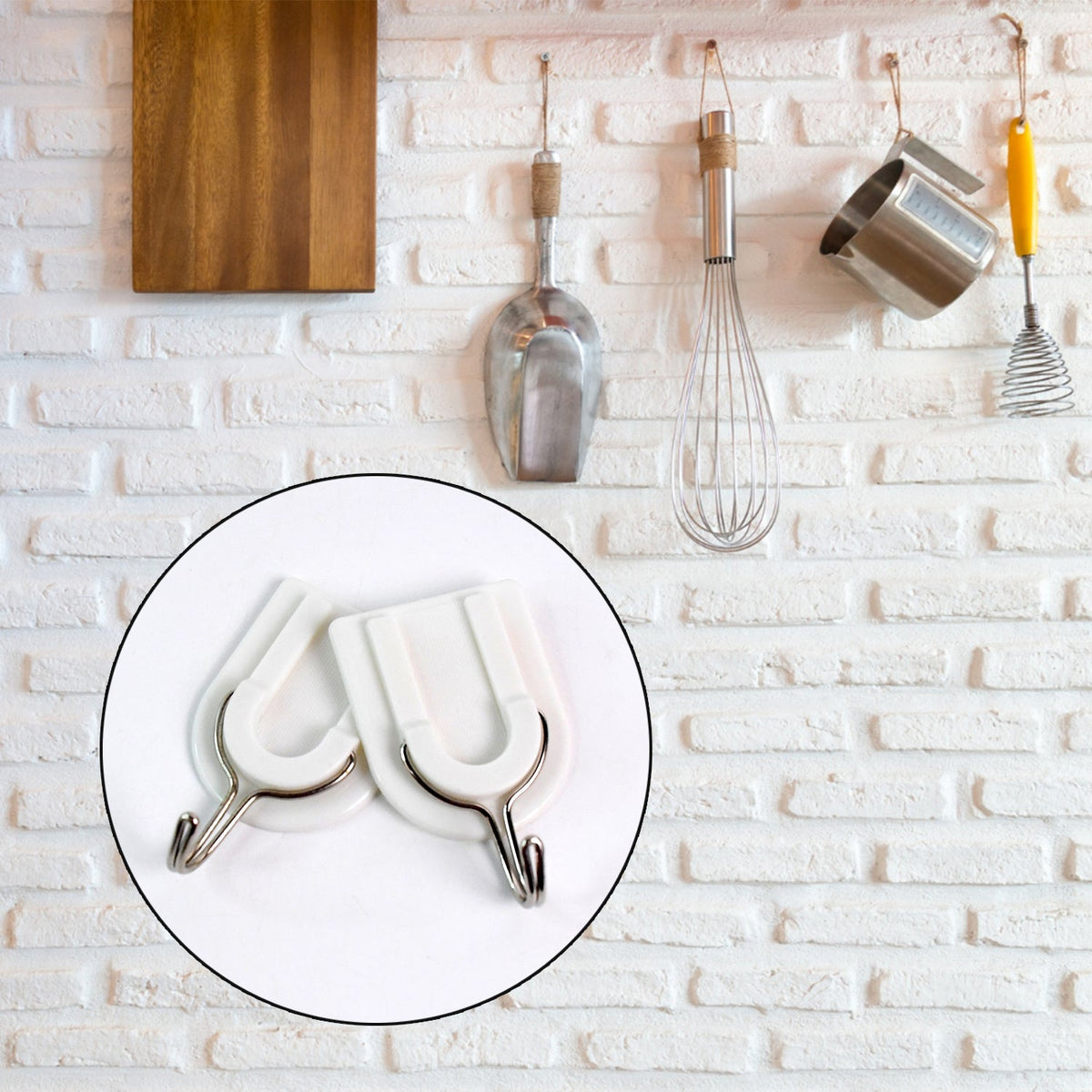 Close-up of a sturdy adhesive wall hook applied to a smooth ceramic tile surface.