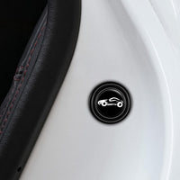 Car door shock absorber sticker discreetly applied to a car door edge.