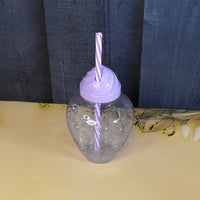 Lightweight plastic cup with a secure lid, showcasing its portable design.