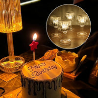 Battery operated LED mini table lamps arranged as wedding table centrepieces for ambient lighting.
