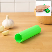 Silicone garlic peeler tube showing flexible rolling design