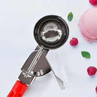 Quick-release lever ice cream scoop for clean dessert portions