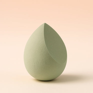Close-up shot of the soft, non-latex texture of the BeautyBare makeup sponge.