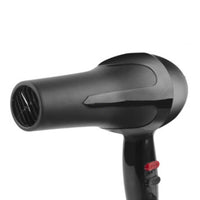 Sleek black hair dryer with concentrator nozzle for precise styling.