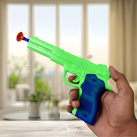 Close-up of the toy gun with a soft suction dart attached, demonstrating safety.