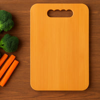 Chopping board made of natural wood with groove for containing juices