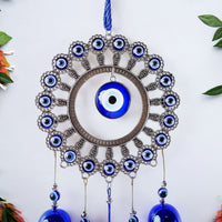 Full view of Om evil eye wind chime with soothing bells