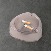 Heat resistant and sturdy plastic ashtray with cigarette grooves