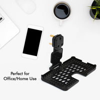 PHOBIA black mobile charging wall holder securely installed on a power socket.