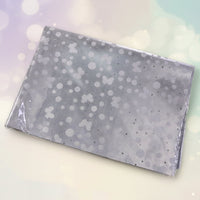 Polka dot pattern on silver luxury gift wrapping paper sheets