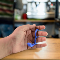Durable plastic hook-style mobile stand holding smartphone upright
