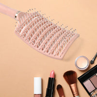 Close-up of ergonomic massage hair comb bristles with rounded tips