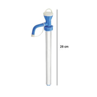 User demonstrating the manual hand pump for kitchen oil, showing its utility.
