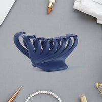 Mini pastel color hair claw clips with wide teeth for secure hold