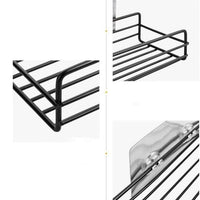 Self-adhesive wall shelf installed in a modern bathroom.