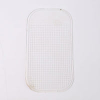 Clear anti-slip dashboard mat blending with vehicle interior