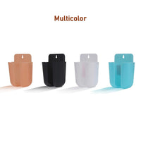 Wall organizer box holding a remote control and a mobile phone.