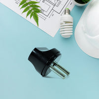 Side view of black 2 Pin Plug Adapter showcasing compact design
