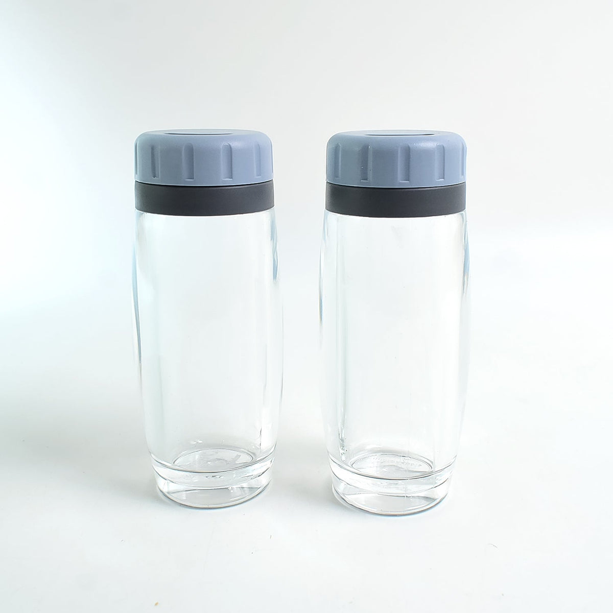 Apex acrylic spice dispensers with ergonomic flip-top lids for easy pouring of salt and pepper