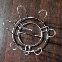 Elegant round glass stand for efficient kitchen storage.