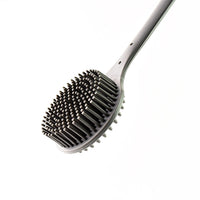 Deep clean silicone shower brush with quick dry hanging design