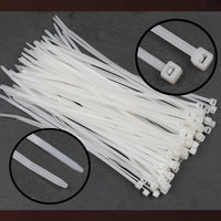 Black 10-inch cable ties from Organivo, shown coiled and ready for diverse applications.