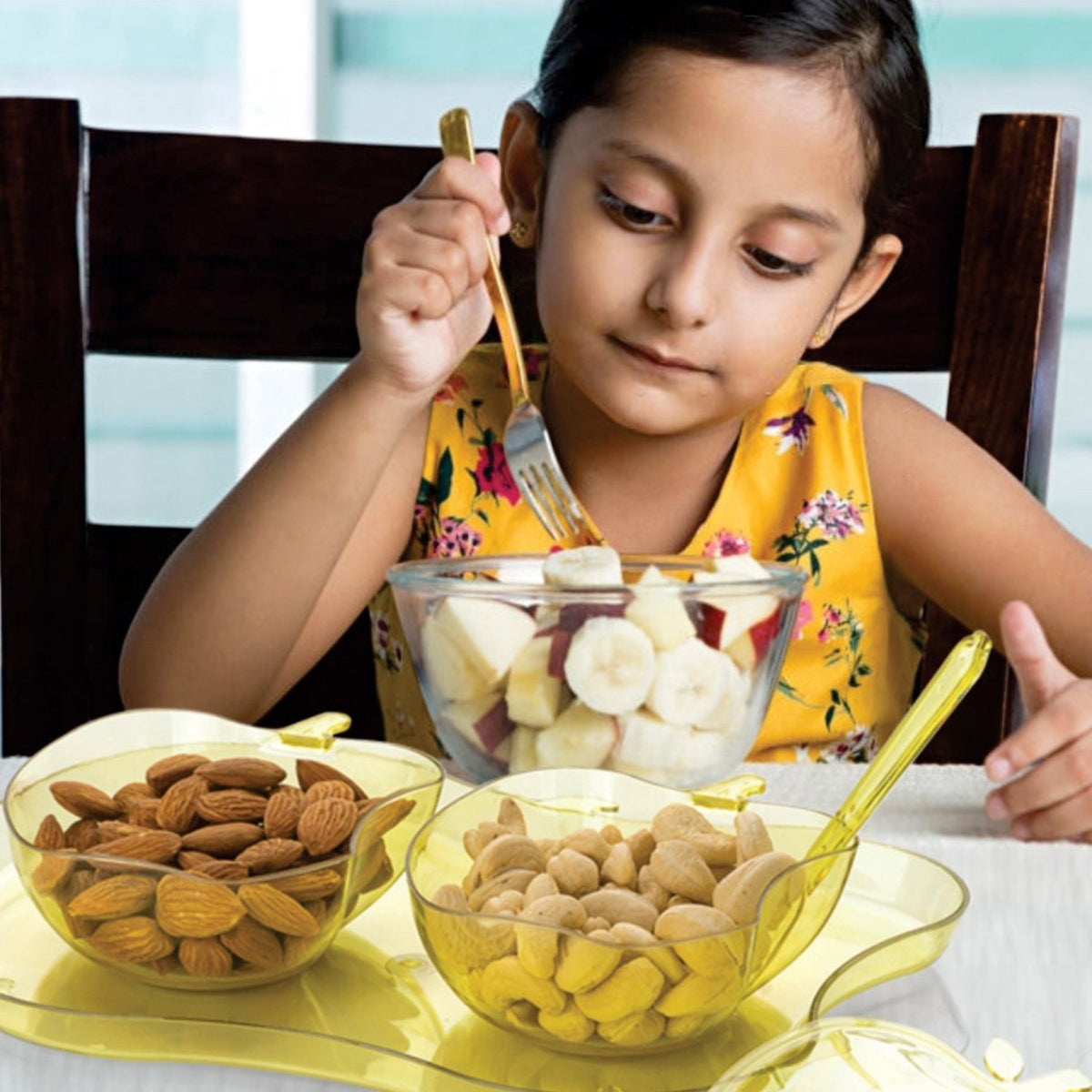The complete apple shape serving set with all components neatly arranged.