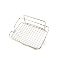 Elevated stainless steel soap stand holding bathroom essentials securely