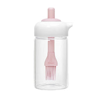 Multi-functional 2-in-1 oil dispenser and brush set, ideal for various culinary tasks.