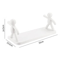 A single floating wall shelf used as a functional display area for small home accents.