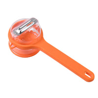 Clean stainless steel vegetable peeler with ergonomic grip