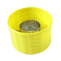 Handheld corn peeler tool shown while removing kernels manually