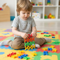 Kids playing blocks stacking game to develop motor skills