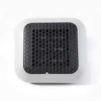 Small room warmed by the compact 600W plug-in wall-mounted room heater