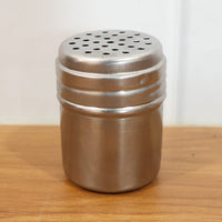 Neutral photo of shaker container made for seasoning and dry spices