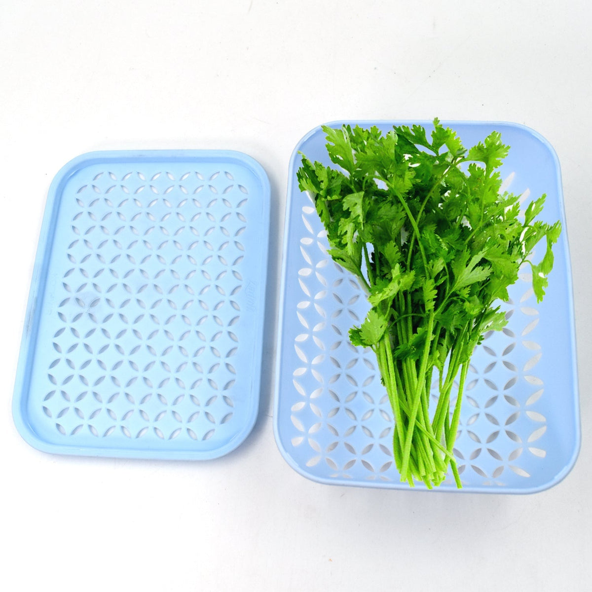 Neatly organized Kothmir Basket holding fresh green vegetables.