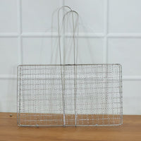 Heavy-duty stainless steel grill basket suitable for camping and picnics